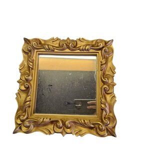 Wall Mirror with a wooden frame. 11" x 15" Good Condition. Grade B